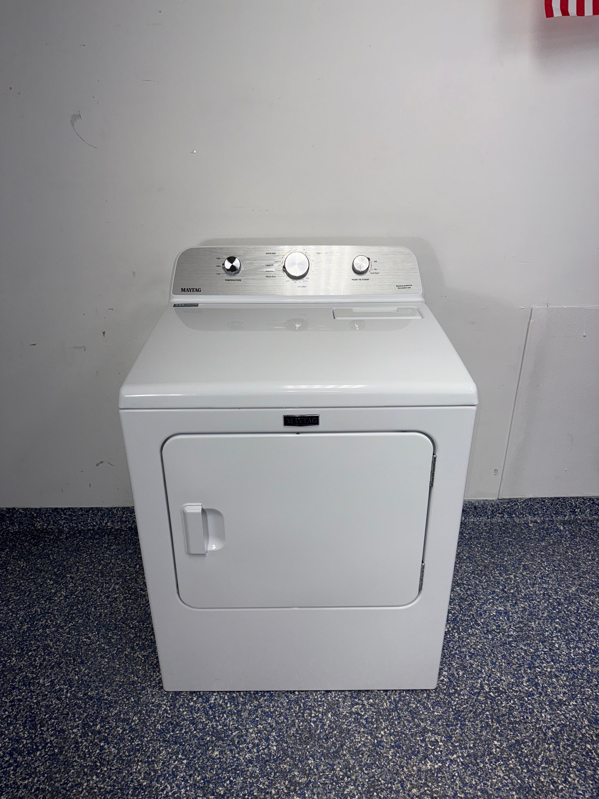 Front view of the MAYTAG MED4500MW electric dryer in a Kansas City laundry room.