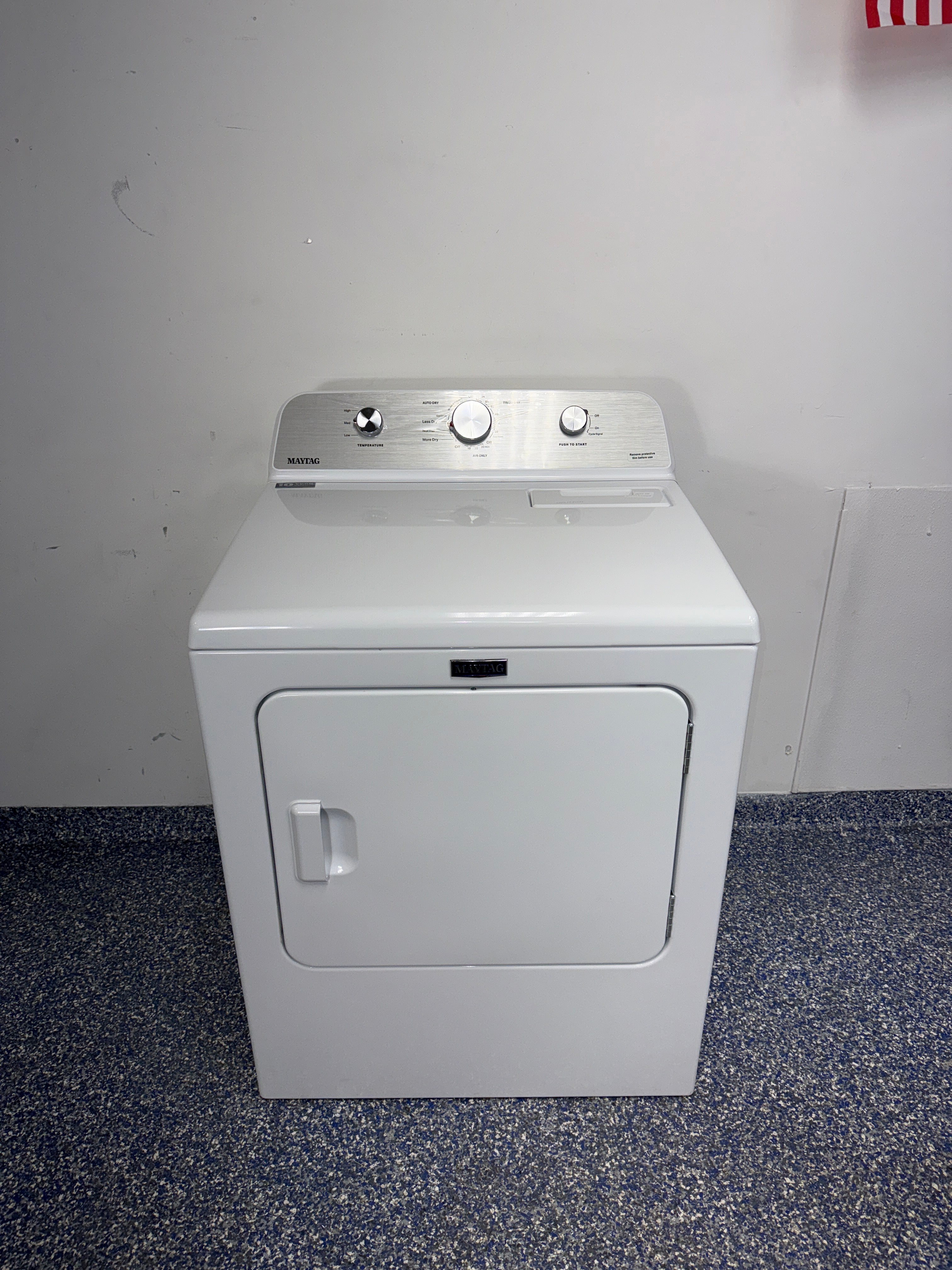 Front view of the MAYTAG MED4500MW electric dryer in a Kansas City laundry room.