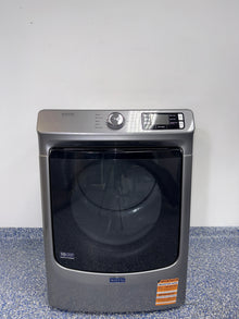 A front view of the MAYTAG MED5630HC dryer, highlighting its heavy-duty motor, ready for installation in a Kansas City laundry room.