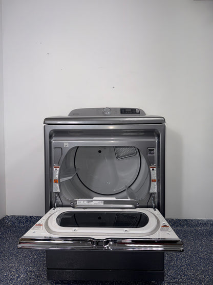 The interior of the MAYTAG MED7230HC dryer, showing the spacious drum and Sanitize Cycle option, for sale in Kansas.