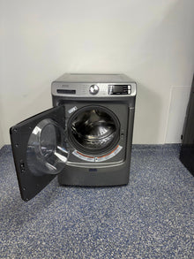 Close-up of the Extra Power button on the MAYTAG MHW5630HC front-load washer, shown for Kansas City homes.