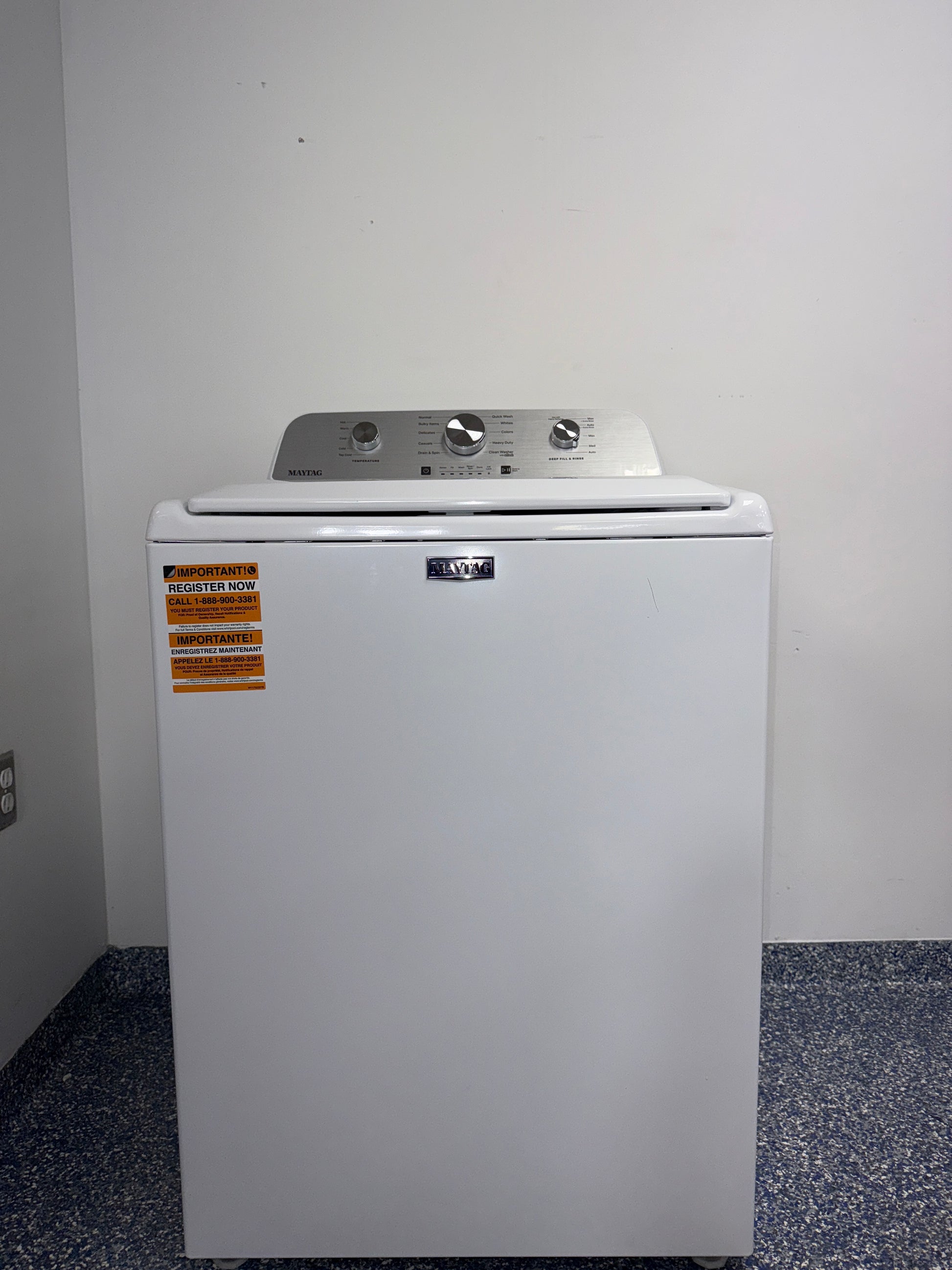 A close-up view of the top panel of the MAYTAG MVW4505MW washer, showing its Auto Sensing technology, perfect for an Overland Park home.