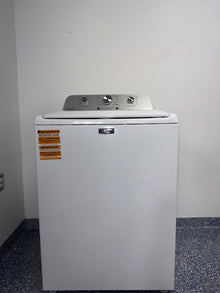 A close-up view of the top panel of the MAYTAG MVW4505MW washer, showing its Auto Sensing technology, perfect for an Overland Park home.