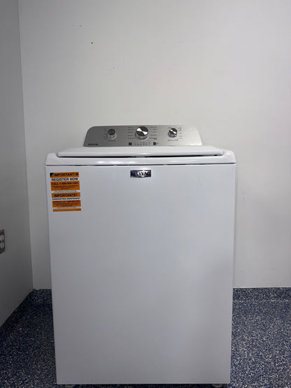 A close-up view of the top panel of the MAYTAG MVW4505MW washer, showing its Auto Sensing technology, perfect for an Overland Park home.