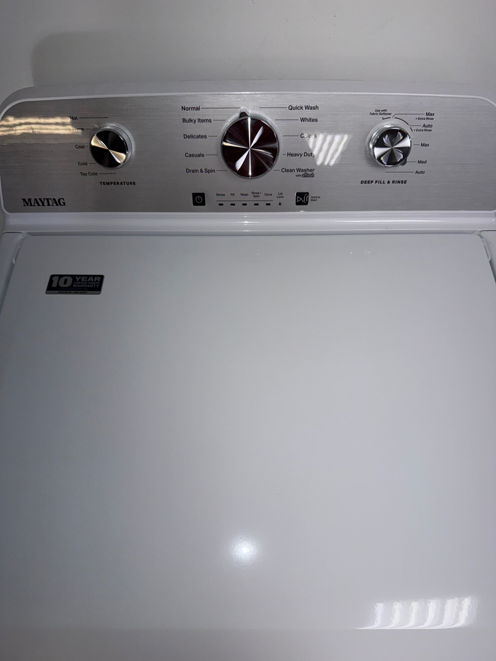 The MAYTAG MVW4505MW top load washer from the front, highlighting its Deep Fill and PowerWash Agitator features and a great deal in Kansas.