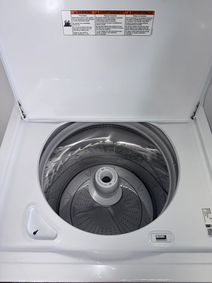 A view of the top panel of the MAYTAG MVW4505MW0 washer, showing its Auto Sensing technology, for sale in Kansas.