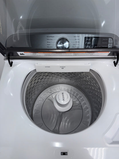 A front view of the MAYTAG MVW6230HW washer, highlighting its built-in water faucet, ready for installation in a Kansas City laundry room.