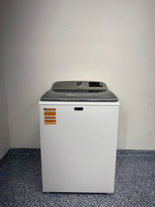 A full frontal image of the Maytag MVW6230HW top-load washer, highlighting its clean white finish and control panel. On sale at Appliance Shark - Scratch & Dent store | Kansas City.