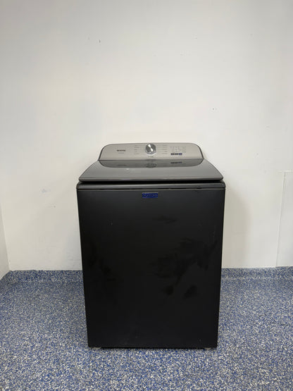 A full frontal image of the MAYTAG MVW6500MBK Top Load Pet Pro Washing Machine, highlighting its Volcano Black finish. On sale at Appliance Shark - Scratch & Dent store | Kansas City.