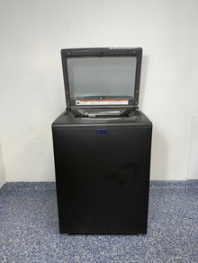 A close-up of the stainless steel wash basket and agitator with the built-in Pet Pro Filter inside the MVW6500MBK. On sale at Appliance Shark - Scratch & Dent store | Kansas City.