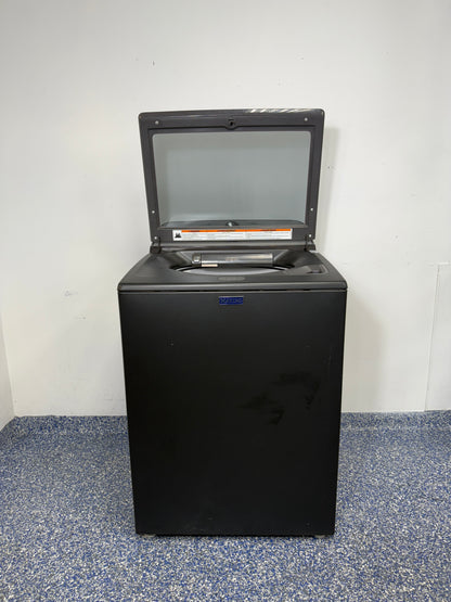 A close-up of the stainless steel wash basket and agitator with the built-in Pet Pro Filter inside the MVW6500MBK. On sale at Appliance Shark - Scratch & Dent store | Kansas City.