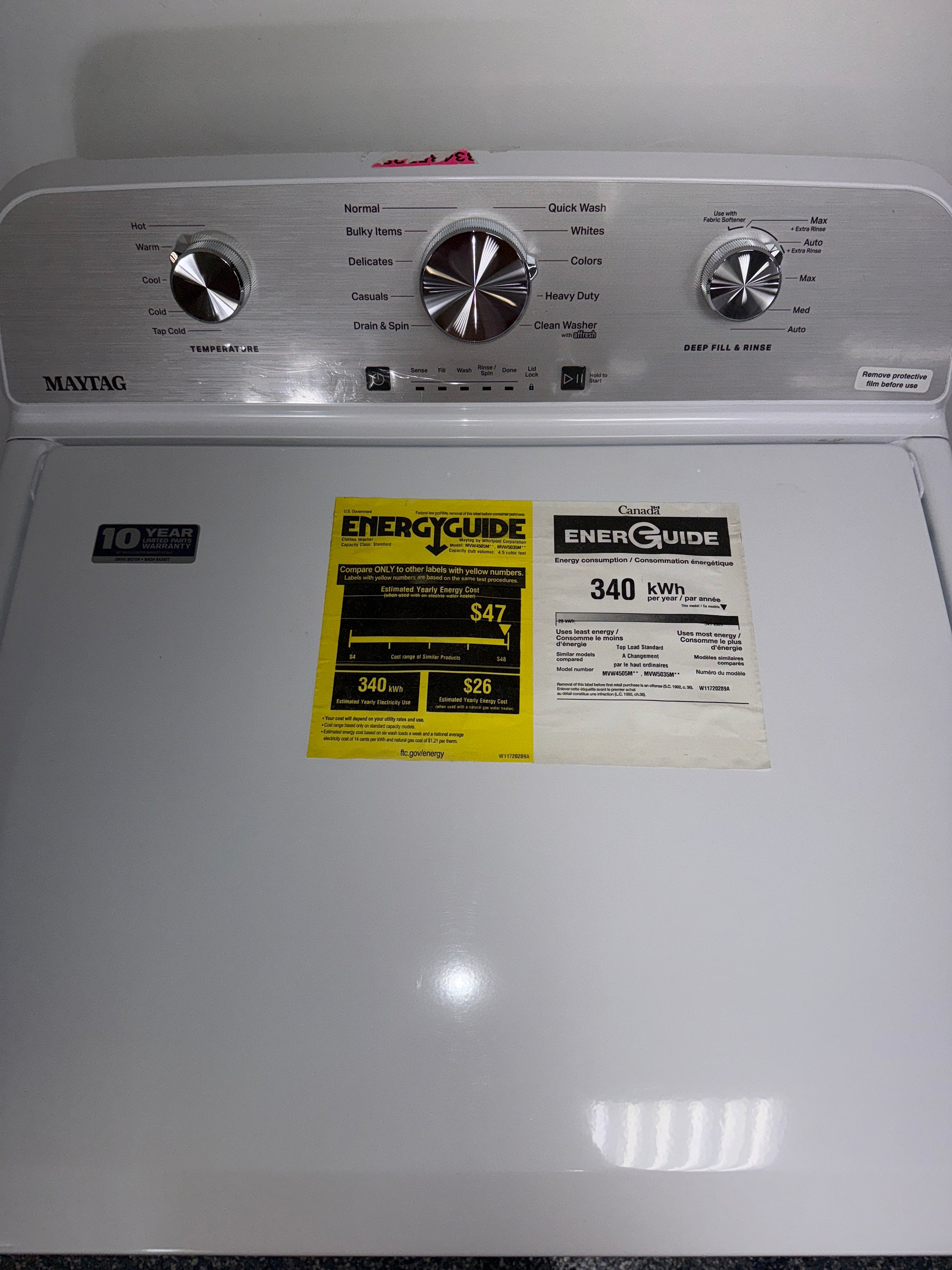A front view of the MAYTAG MVW6500MW washer, highlighting its top controls, ready for installation in a Kansas City home.