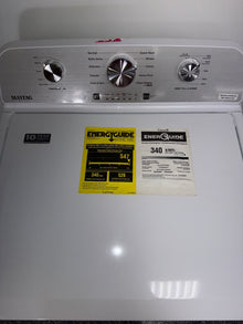 A front view of the MAYTAG MVW6500MW washer, highlighting its top controls, ready for installation in a Kansas City home.