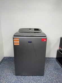 A full frontal image of the Maytag MVW7230HC top-load washing machine, highlighting its Metallic Slate finish and control panel. On sale at Appliance Shark - Scratch & Dent store | Kansas City.