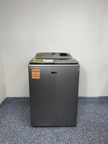 A full frontal image of the Maytag MVW7230HC top-load washing machine, highlighting its Metallic Slate finish and control panel. On sale at Appliance Shark - Scratch & Dent store | Kansas City.