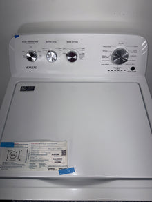 A close-up view of the PowerWash Agitator inside the MAYTAG washer, perfect for an Overland Park home.