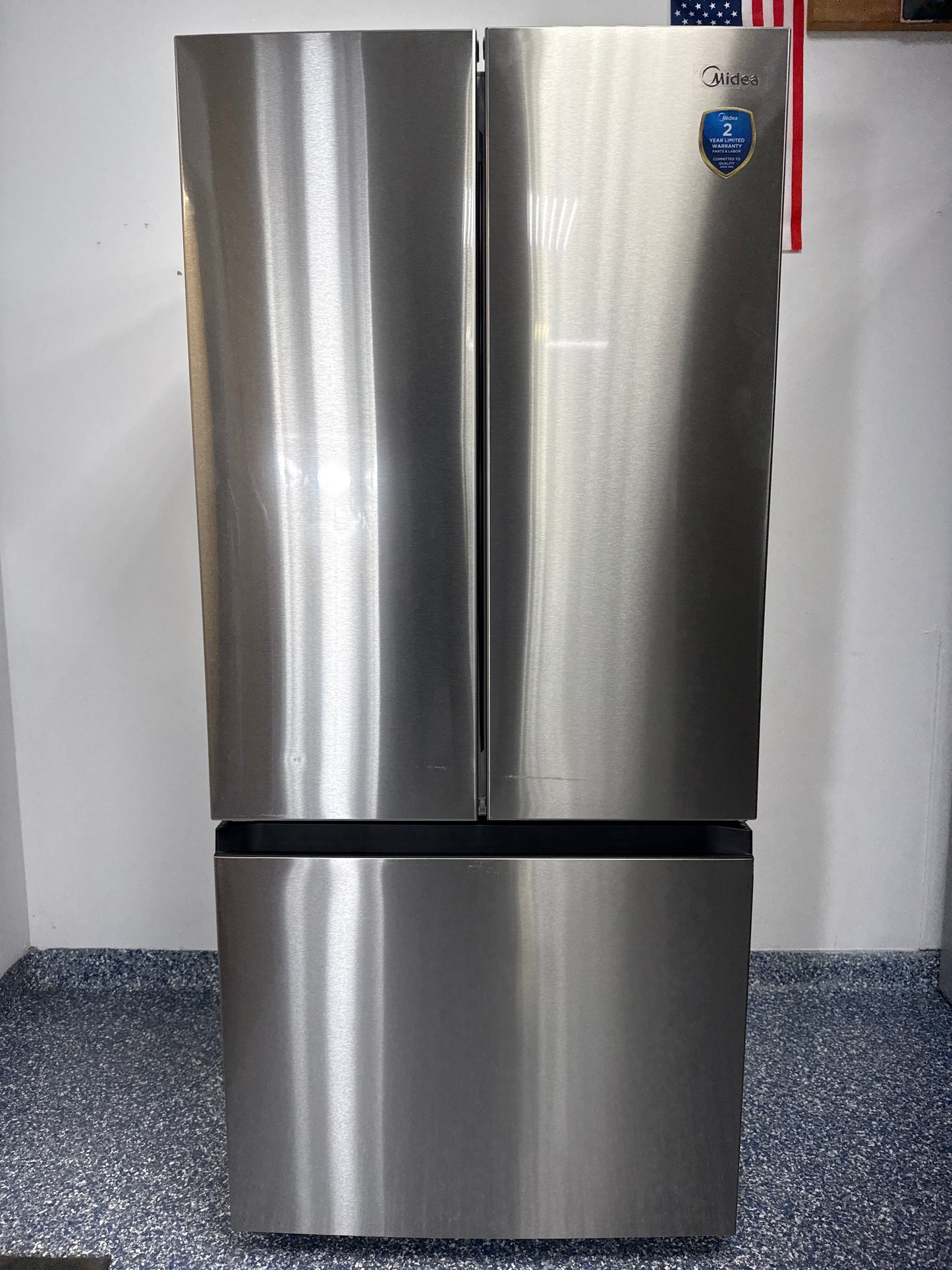 Front view of the MIDEA MRF18B4AST 18 cu ft French-door refrigerator in stainless steel, available in Overland Park, KS.