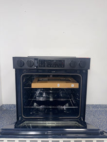 The SAMSUNG 6.3 cu. ft. electric range, model NSE6DB830012, available at Appliance Shark.