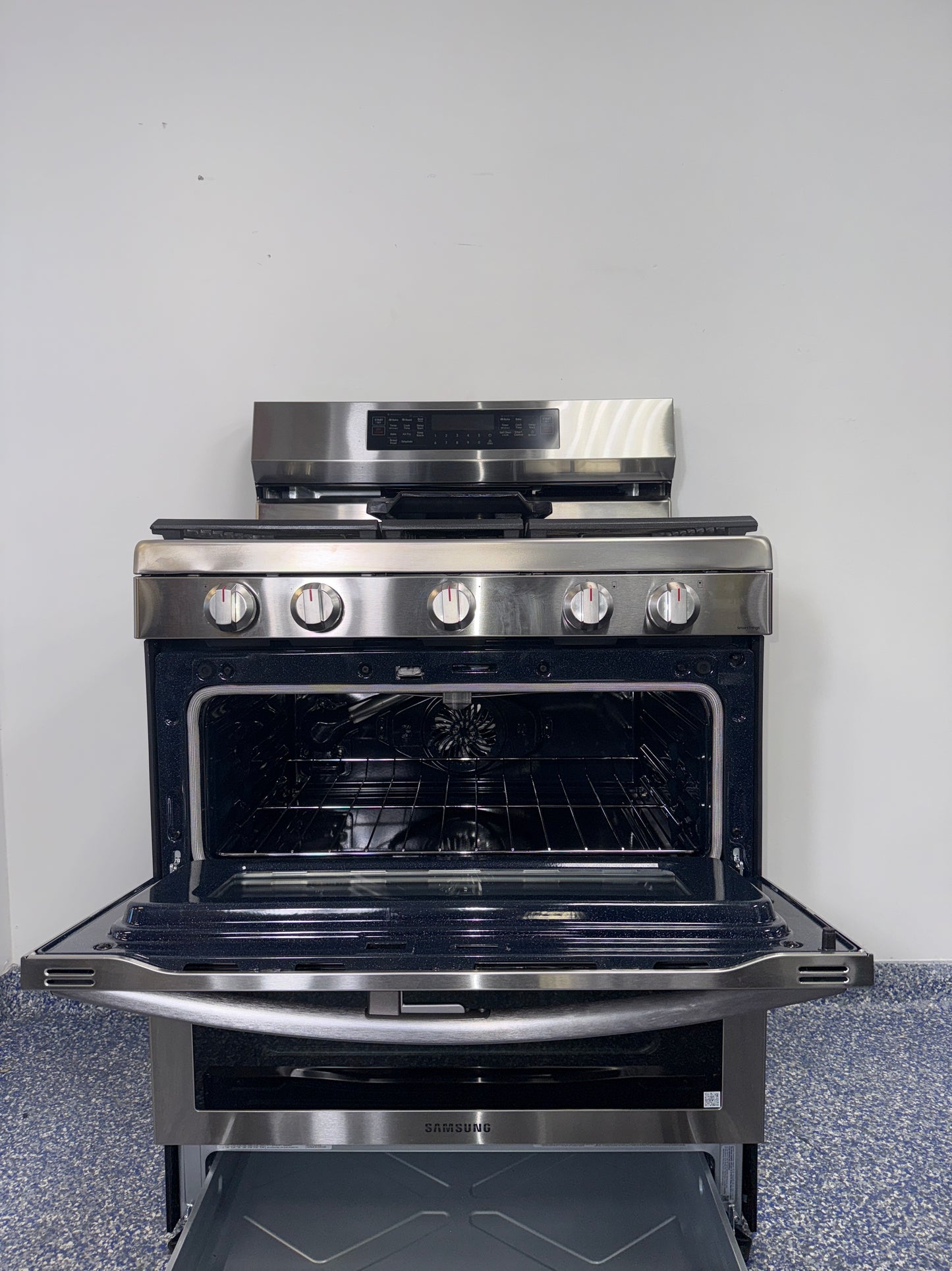 The SAMSUNG 6.0 cu. ft. gas range, model NX60A6751SS, available at Appliance Shark.