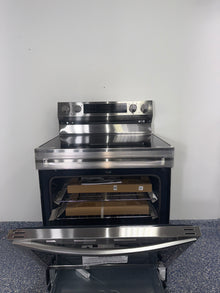 A view of the interior of the SAMSUNG NE63D6711SR oven, showcasing the Convection+ system, an ideal appliance for homes in Overland Park, KS.