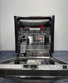 Scratch & dent SAMSUNG DW80CG5451SR dishwasher displayed at Appliance Shark in Overland Park with sleek stainless steel design.