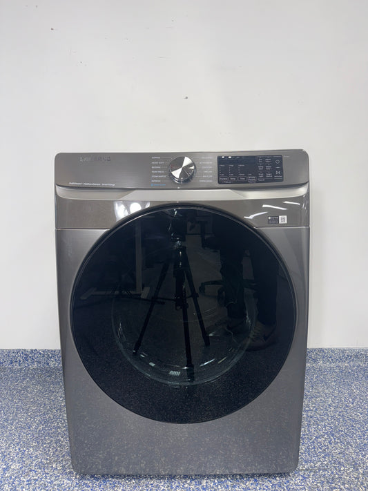 The SAMSUNG DVE45B6300P electric dryer from the front, highlighting its Steam Sanitize+ feature and a great deal in Kansas.