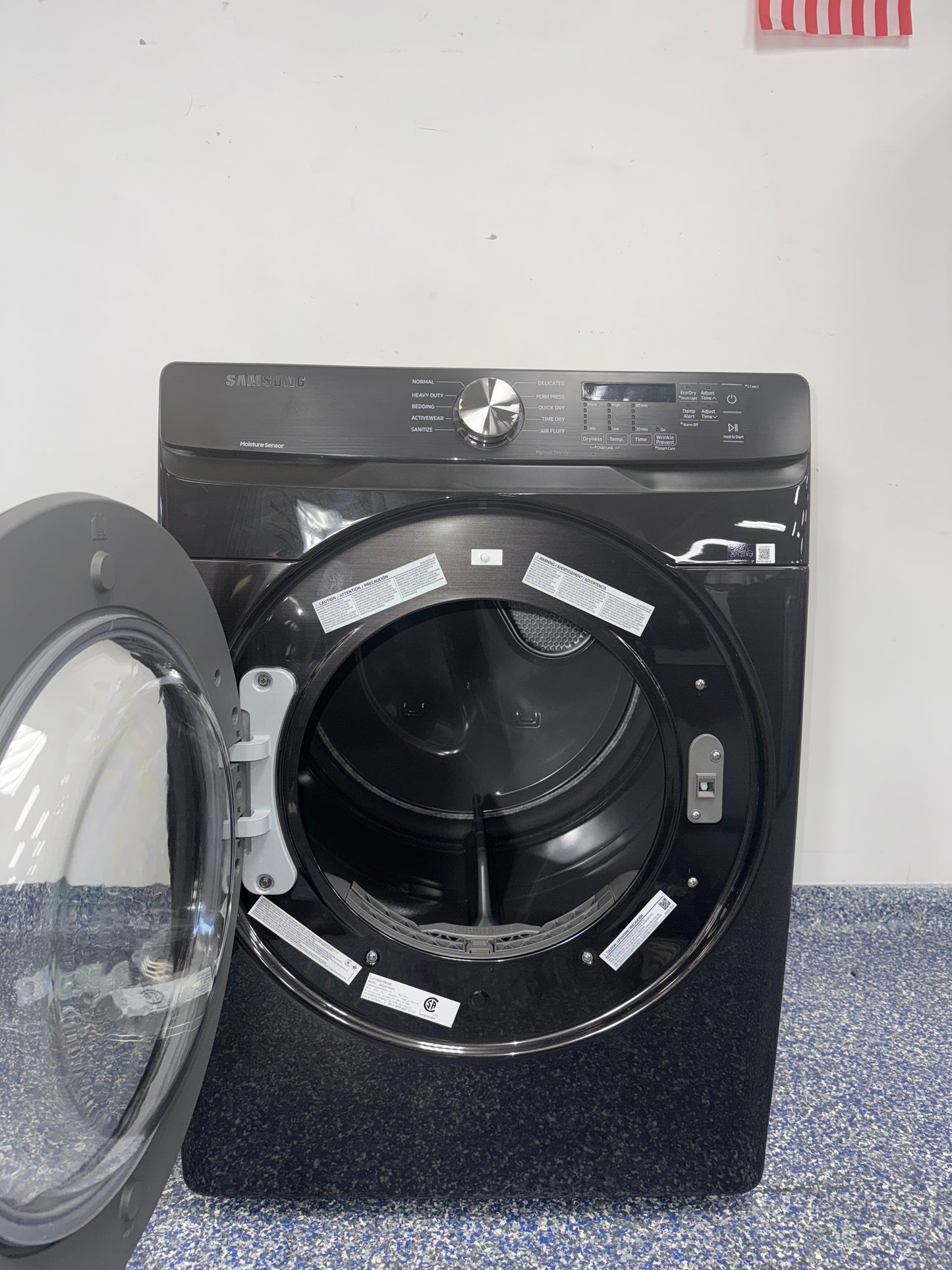 Control panel of the SAMSUNG DVG45T6000V showing cycle options, featured in Kansas City homes.