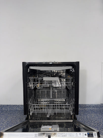 StormWash+™ rotating jets inside SAMSUNG DW80CG5450MT dishwasher, available as a scratch and dent deal in Kansas City.