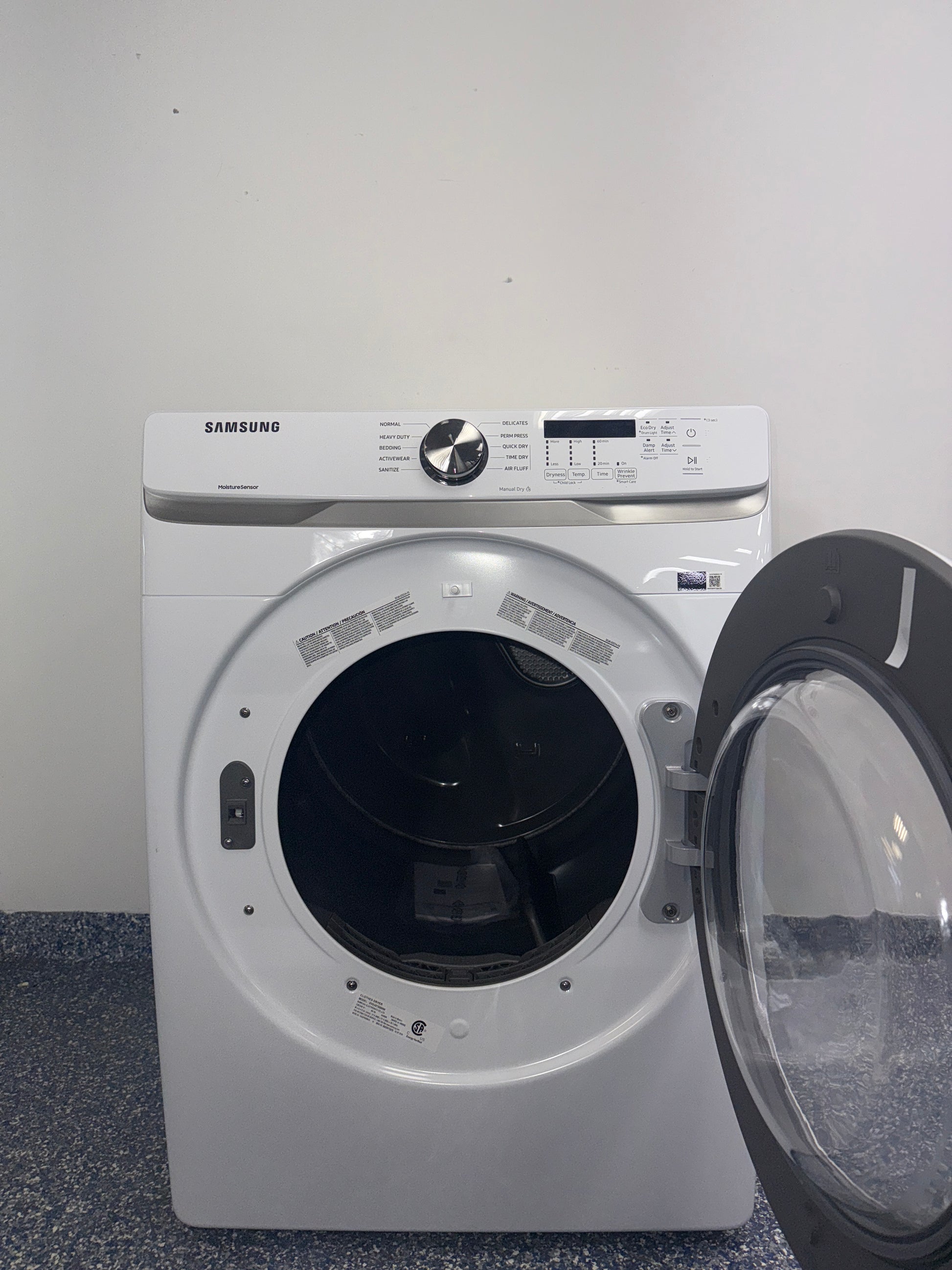 The SAMSUNG electric dryer, model DVE45T6000W, featuring the Wrinkle Prevent Option, available at Appliance Shark.