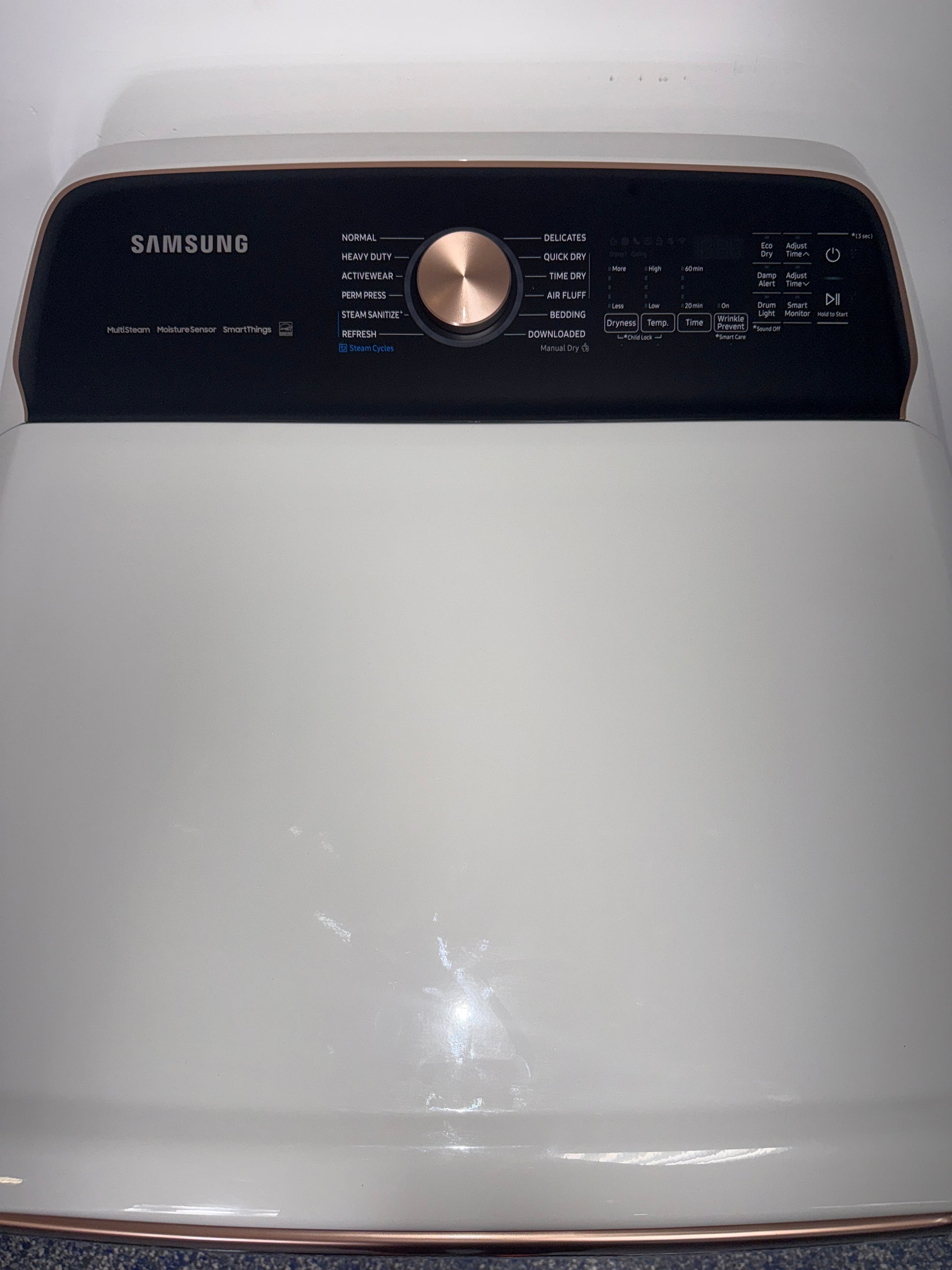 The SAMSUNG gas dryer, model DVG55CG7500E, featuring the Smart Dial, available at Appliance Shark.