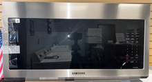 A view of the SAMSUNG MC17T8000CS microwave with its Sensor Cook technology, ready for installation in a Kansas City kitchen.
