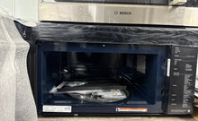 SAMSUNG ME21DG6700SRAA Auto-Dimming Glass Touch Controls panel detail Kansas City home