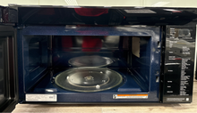Scratch & dent SAMSUNG ME21DB670012 Bespoke microwave displayed at Appliance Shark in Overland Park.