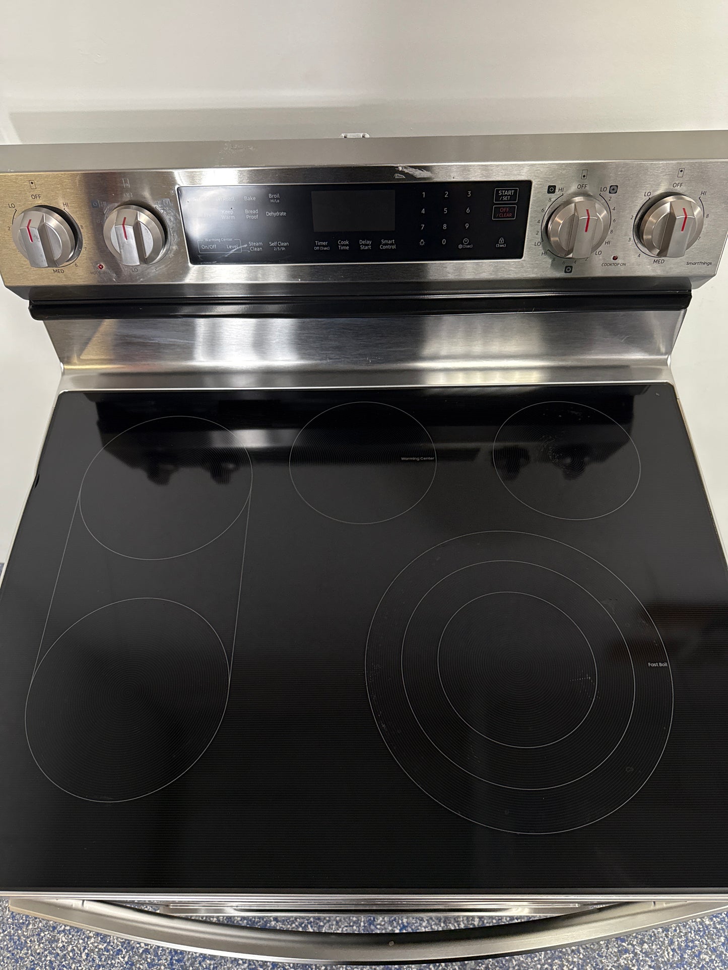 Convection cooking system of SAMSUNG NE63D6511SR electric range, discounted at Appliance Shark in Kansas City.