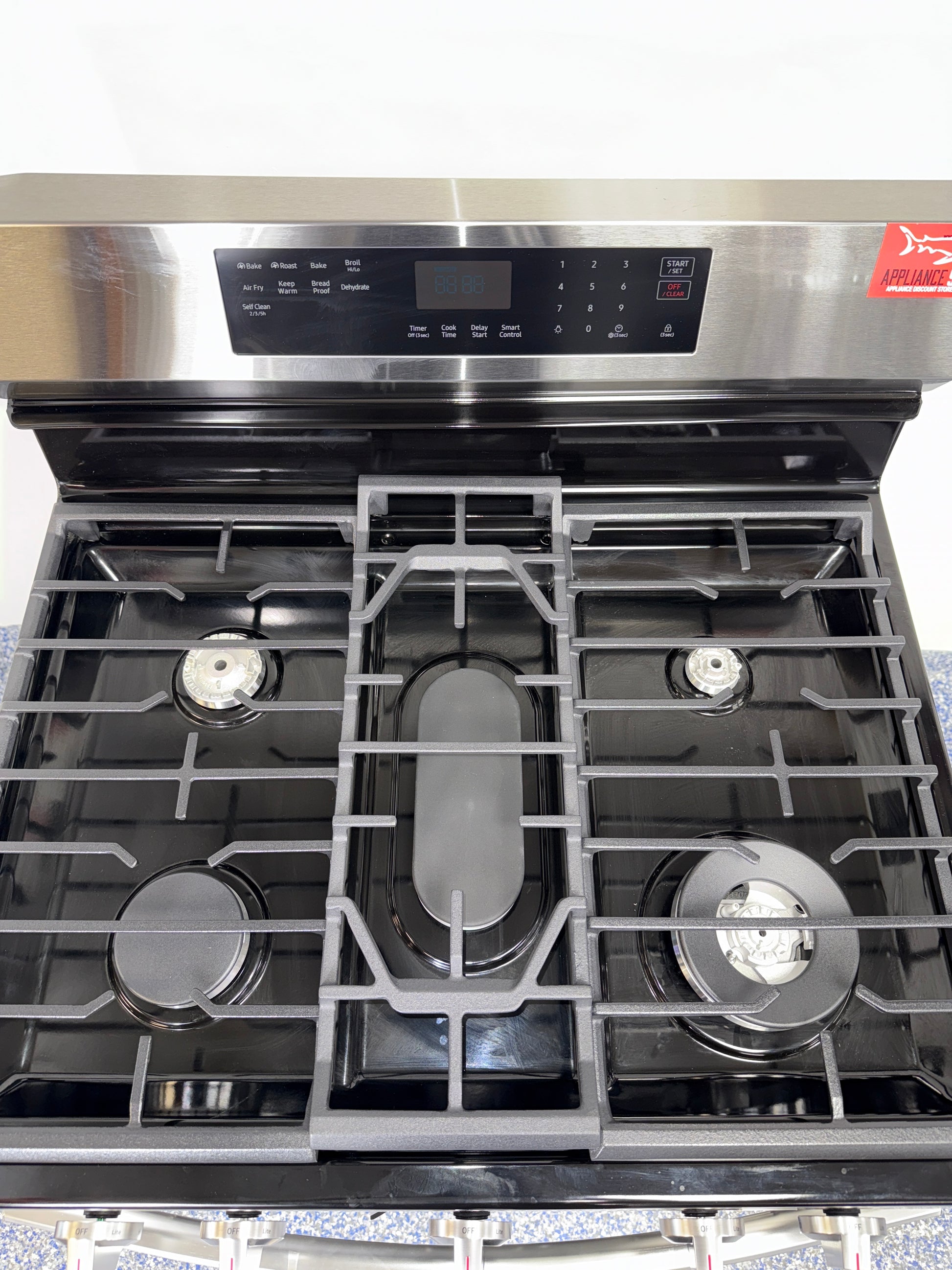 17K BTU Power Burner on the SAMSUNG NX60A6511SS gas range, discounted at Appliance Shark in Kansas City.