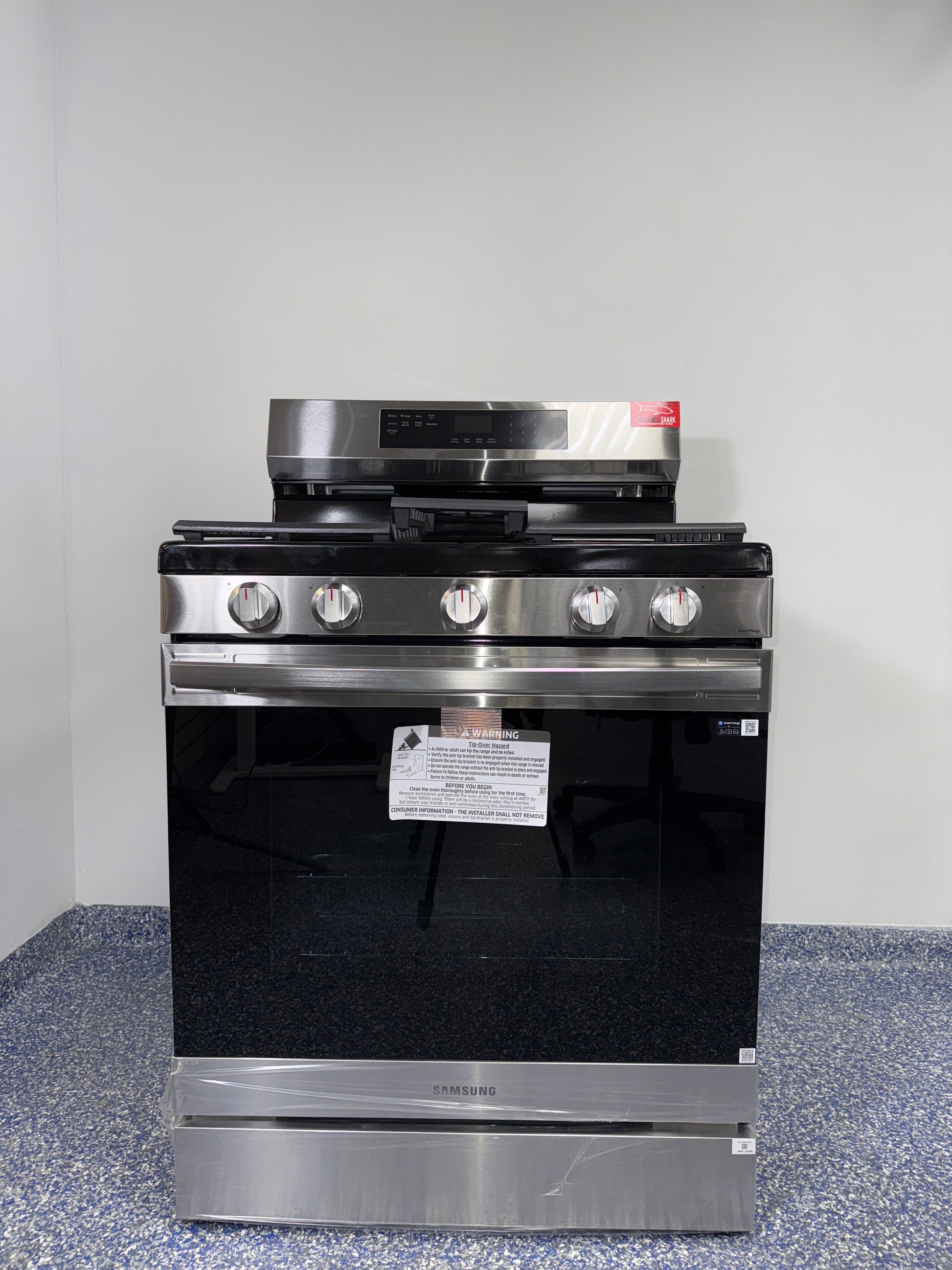 SAMSUNG NX60A6511SS stainless steel gas range scratch and dent special at Appliance Shark in Kansas City.