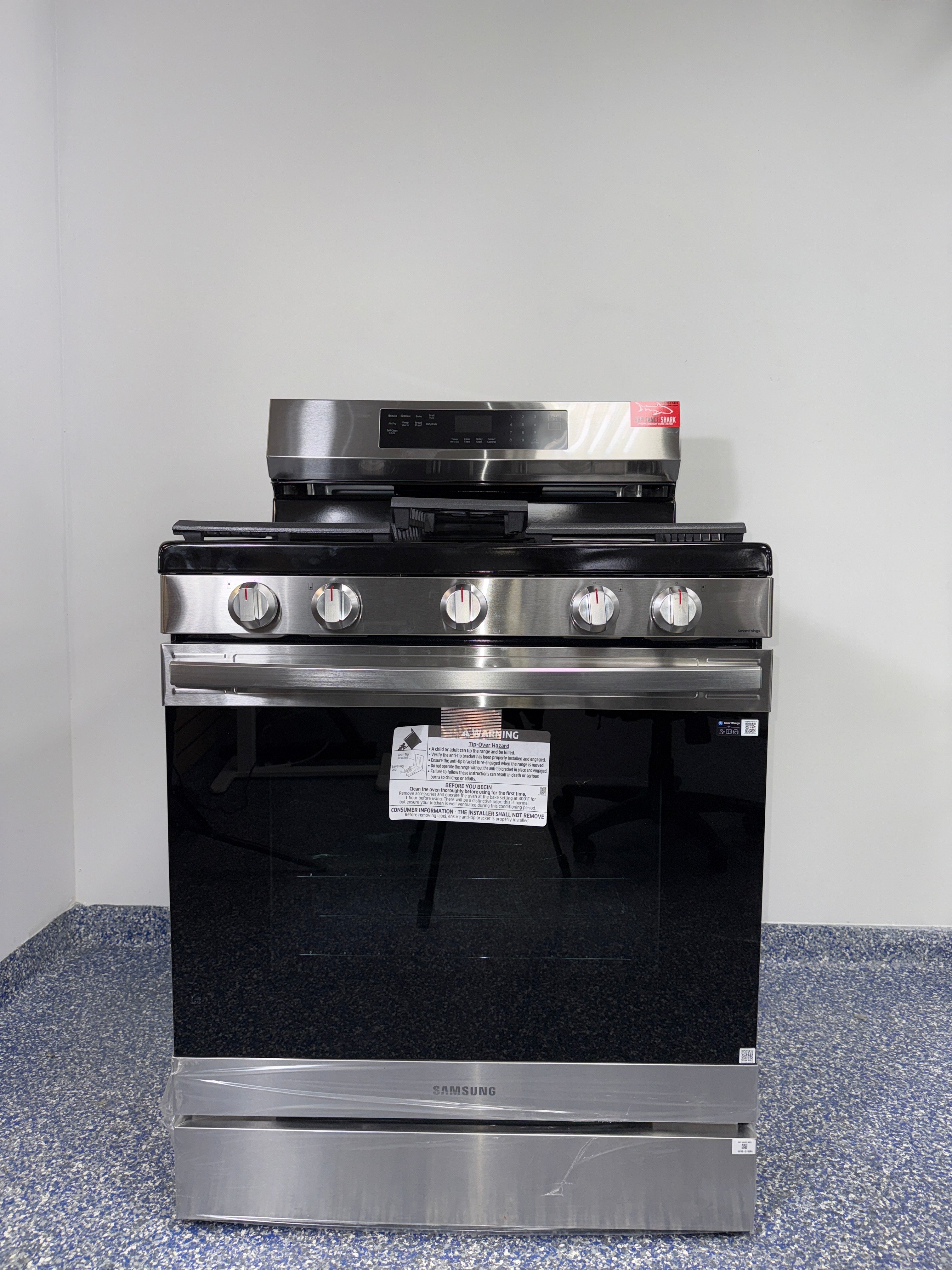SAMSUNG NX60A6511SS stainless steel gas range scratch and dent special at Appliance Shark in Kansas City.