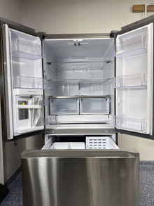 Scratch & dent SAMSUNG RF25C5551SR refrigerator displayed at Appliance Shark in Overland Park with Beverage Center convenience.