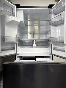Scratch & dent SAMSUNG RF32CG5400MT refrigerator displayed at Appliance Shark in Overland Park with French door styling.