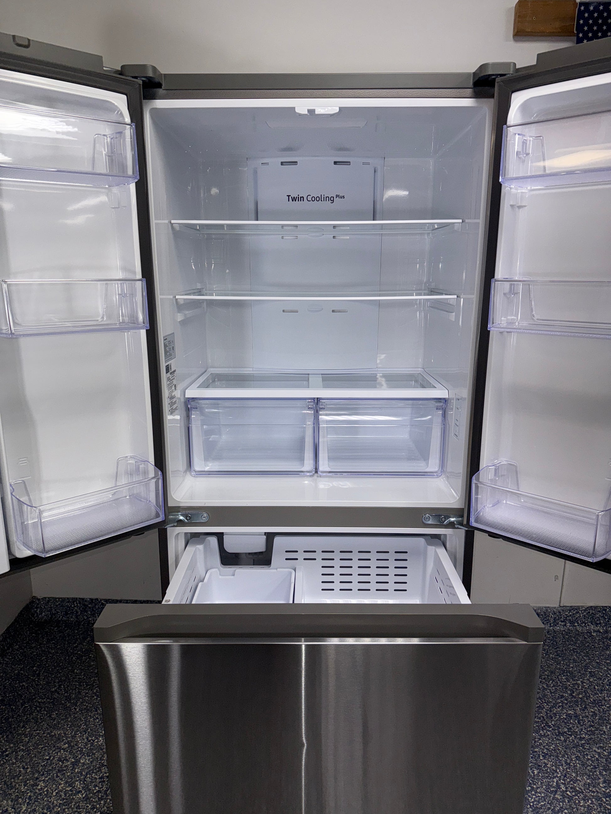 Adjustable shelving inside the SAMSUNG RF18A5101SR French door refrigerator in the Kansas City Metro area.