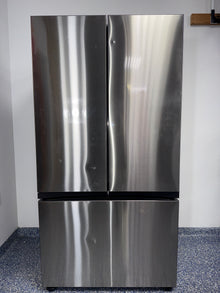 The SAMSUNG RF24BB6600QL refrigerator from the front, a counter-depth model highlighting its concealed Beverage Center™ and a great deal in Kansas.