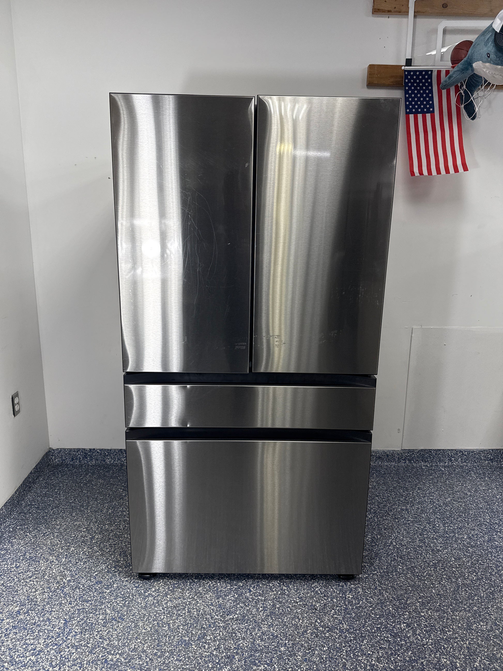 Interior view showing the Beverage Center and water/ice dispensing features of SAMSUNG RF29BB8600QL in Overland Park.