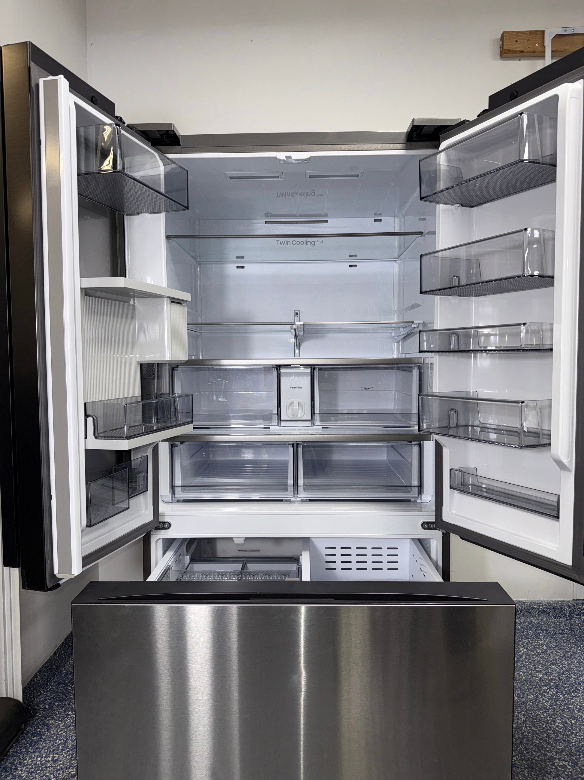 Beverage Center™ water and ice dispenser with auto-fill pitcher on the SAMSUNG RF30BB6600QLAA, shown in Kansas City kitchens.