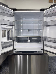 A close-up of the full-width drawer in the SAMSUNG refrigerator, model RF32CG5300SR, for sale in Kansas.