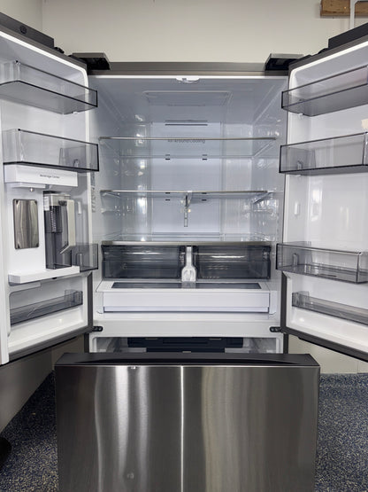 A close-up of the full-width drawer in the SAMSUNG refrigerator, model RF32CG5300SR, for sale in Kansas.