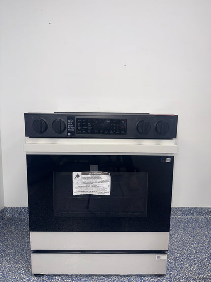A close-up view of the Smart Dial and control panel on the SAMSUNG electric range, an ideal appliance for homes in Overland Park, KS.