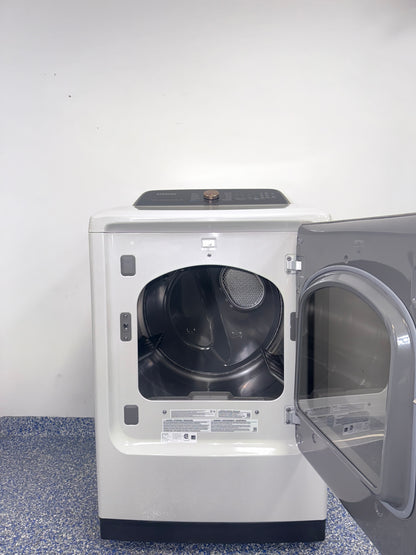 A view of the control panel and door on the SAMSUNG DVG55CG7500E dryer, showcasing its Steam Sanitize+ option, perfect for an Overland Park, KS home.