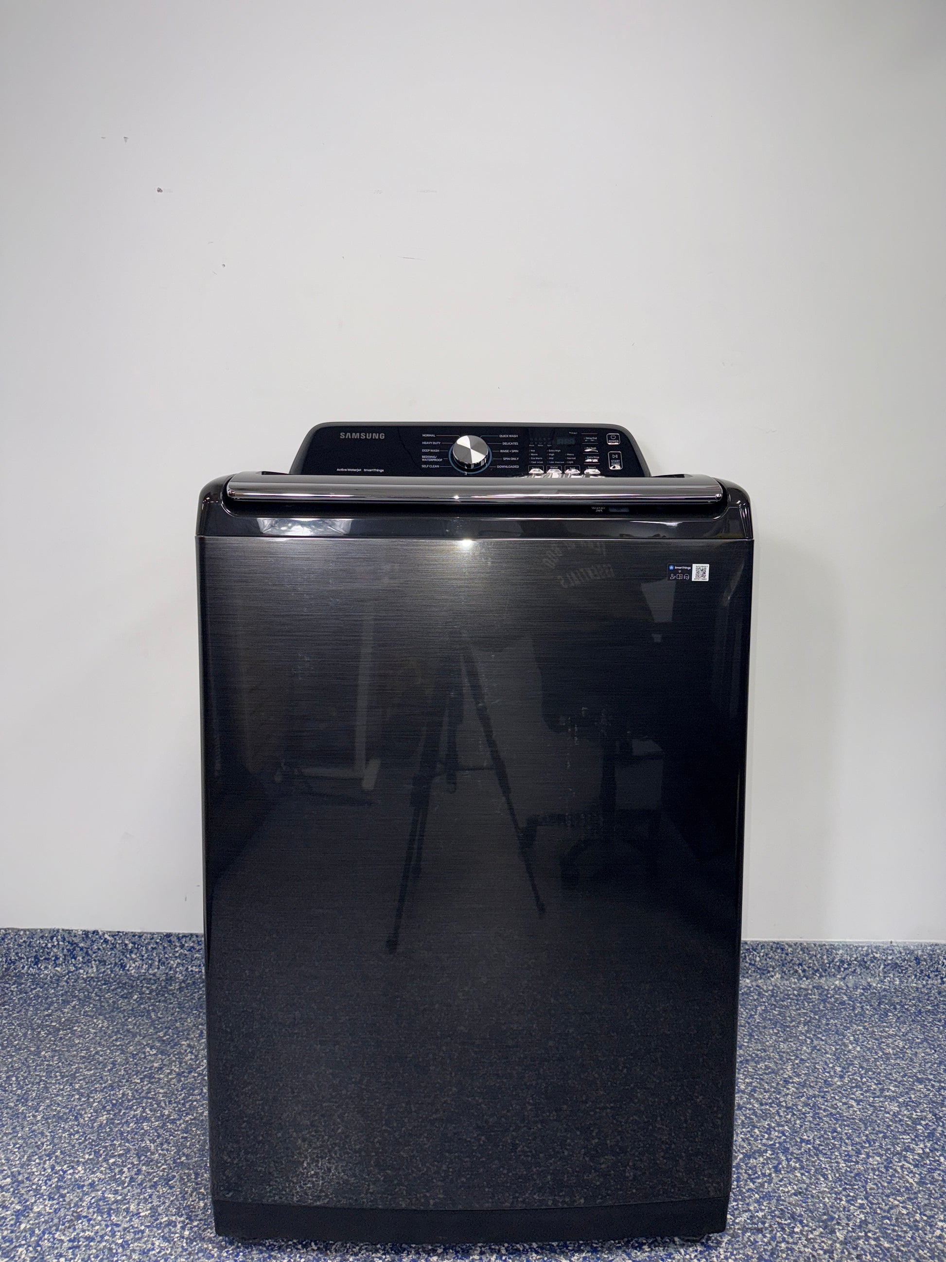 The SAMSUNG WA47CG3500AV top load washer from the front, highlighting its Super Speed Wash feature and a great deal in Kansas.