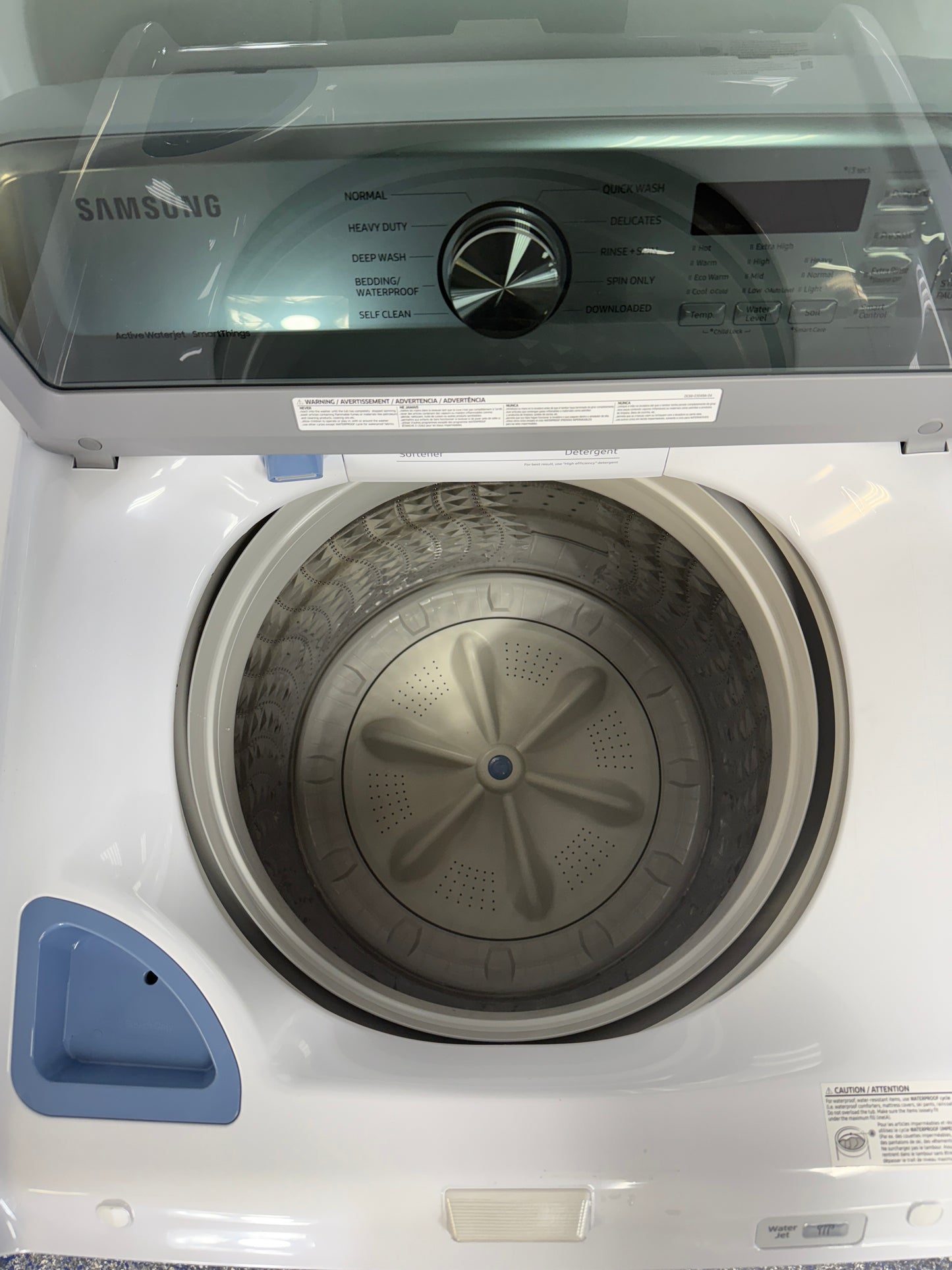 Active WaterJet™ built-in faucet on the SAMSUNG WA47CG3500AW top load washer in Overland Park, KS.