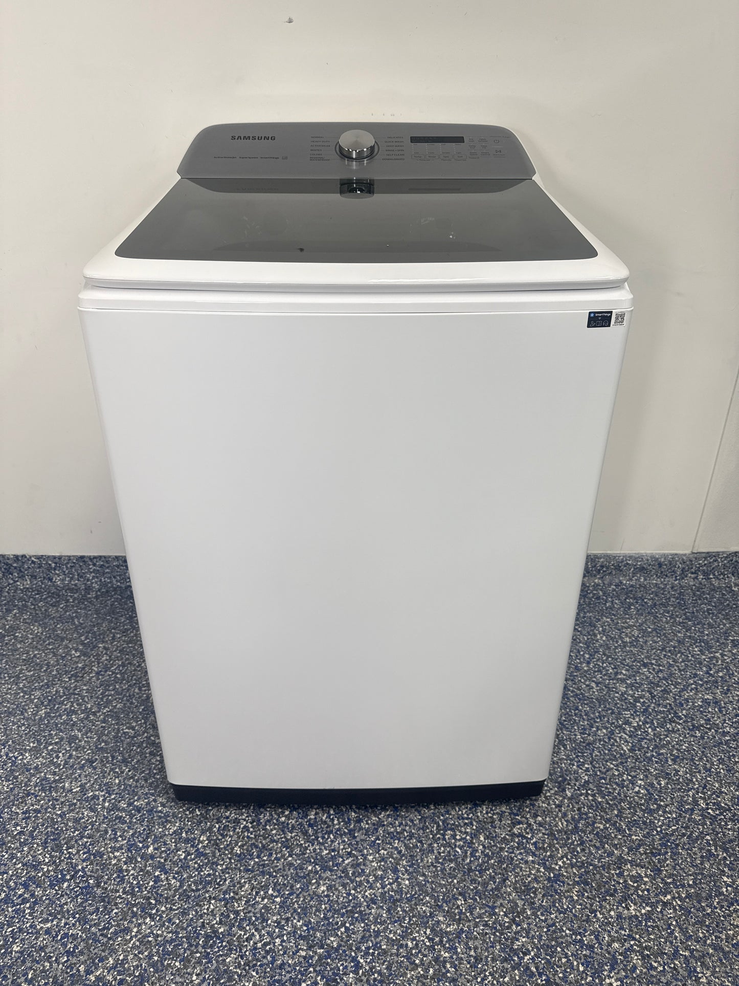 SAMSUNG WA52DG5500AW front view white smart top-load washer Kansas City laundry room